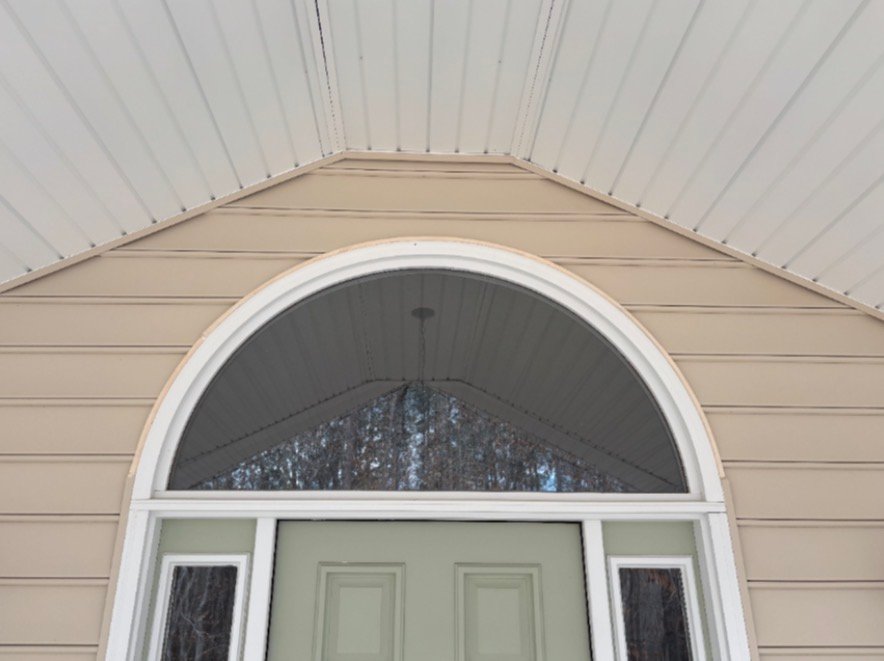 Arched entry & soffit after